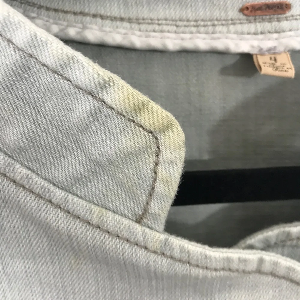 Free People Peplum denim Moto zip jacket.